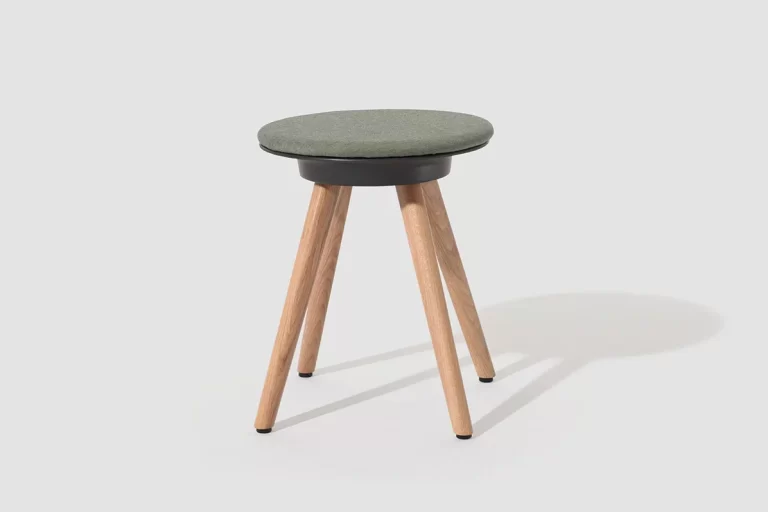 A picture of a wooden Timba stool, designed by Bene and distributed by Walls to Workstations.